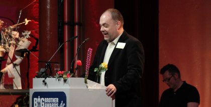 Martin Haase am Redner.innenpult.